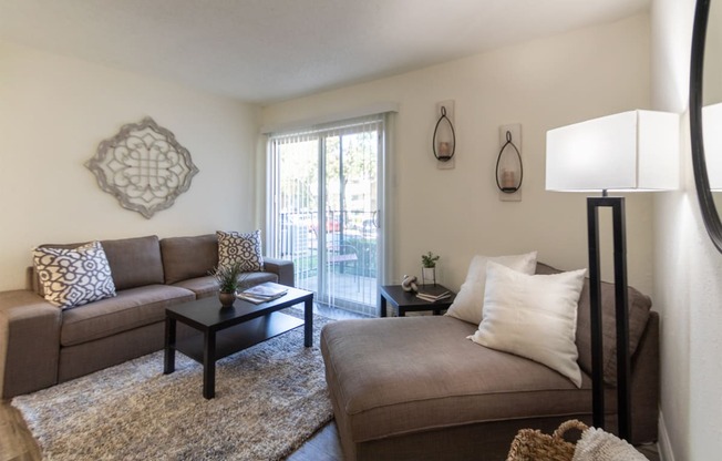 This is a photo of the living room of the 515 square foot 1 bedroom apartment at Canyon Creek Apartments in Dallas, TX