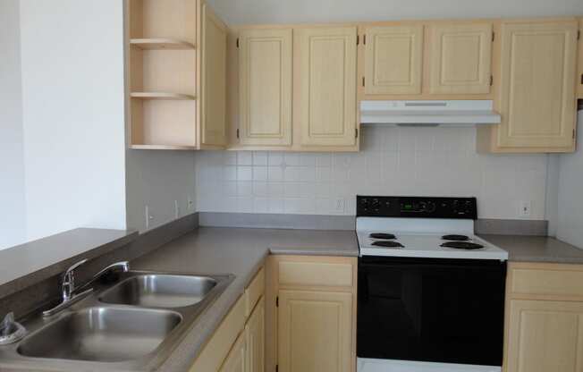 Interior Unit Kitchen Sink Counter Cabinets Stove Allegro Palms Riverview Florida