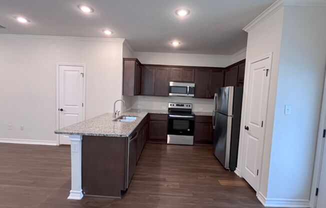 Gorgeous 3-Bed Townhome with Private Yard & Community Perks!