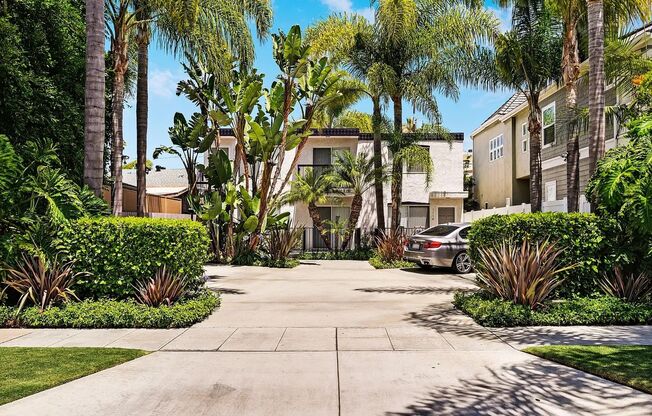 FABULOUS location!  4 blocks to the ocean & Sail Bay, AIR-CONDITIONING, IN-UNIT LAUNDRY! PRIVATE GARAGE + Addn Parking
