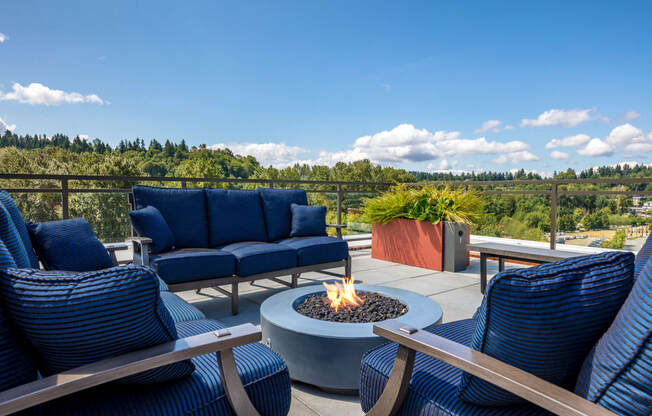 The Merc Apartments Outdoor Terrace and Firepit with Couches