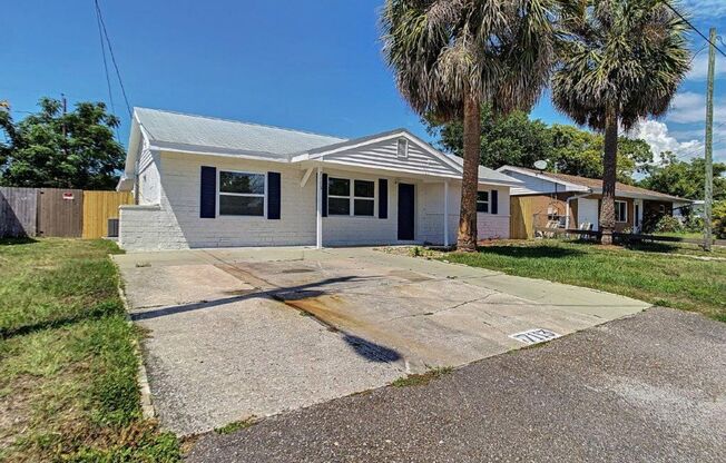 Completely upgraded 3/1 1196 Sq. Ft. with recently renovated bathroom and kitchen with GRANITE& a large open floor plan!!!