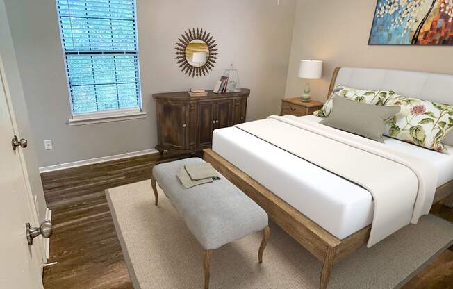 a bedroom with a large bed and a ceiling fan at The Junction, Memphis