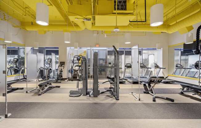 Gym with cardio and weights at Wilshire Vermont, Los Angeles, California
