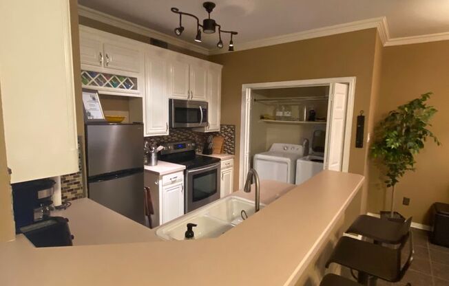 This perfectly designed townhome has it all!