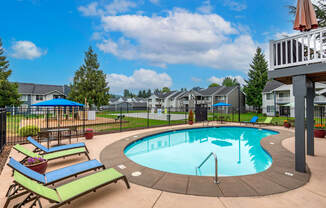 our apartments have a resort style pool with lounge chairs