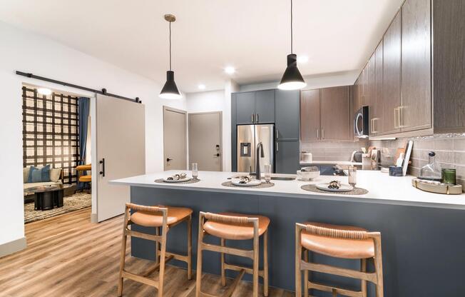 Large kitchen islands with built-in seating create the perfect space for dining, entertaining, meal prep, and everyday gathering.