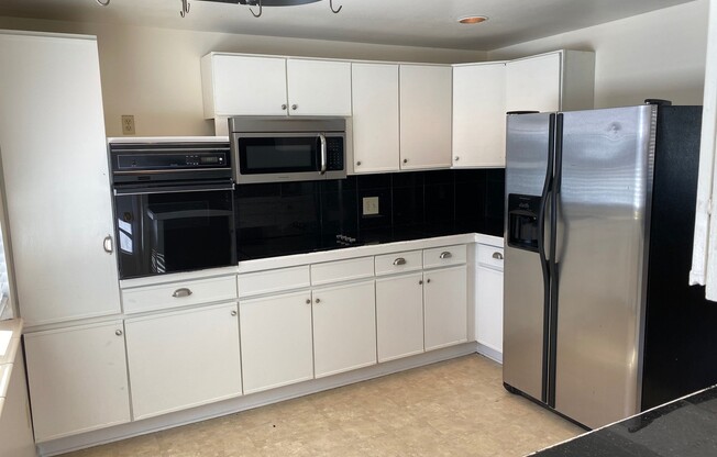 $0 DEPOSIT OPTION. CHARMING BRICK RANCH WITH FINISHED BASEMENT ON LARGE CORNER LOT NEAR DOWNTOWN LITTLETON
