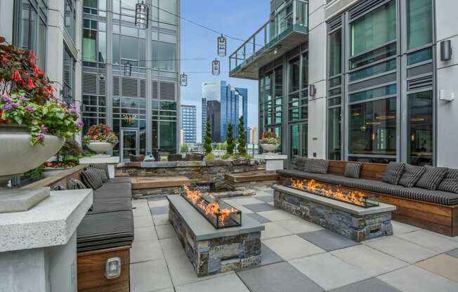 Outdoor Fire Pit with Lounge Seating at The Bravern, 688 110th Ave NE, WA