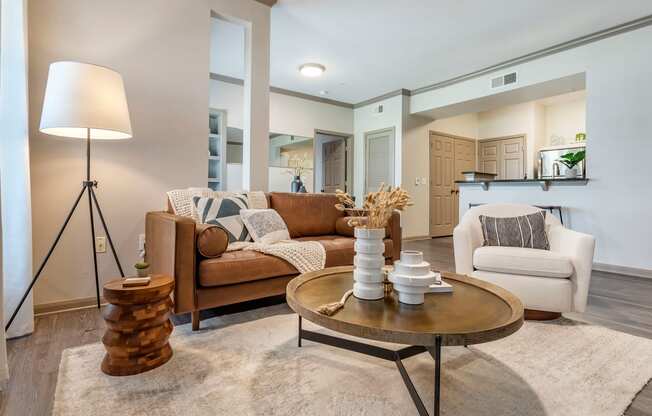 a living room with couches and a coffee table at Reserve by the Lake, Houston