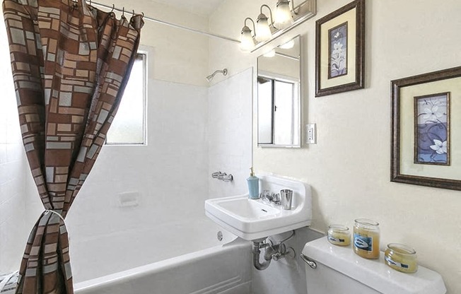 a bathroom with a sink and a bath tub