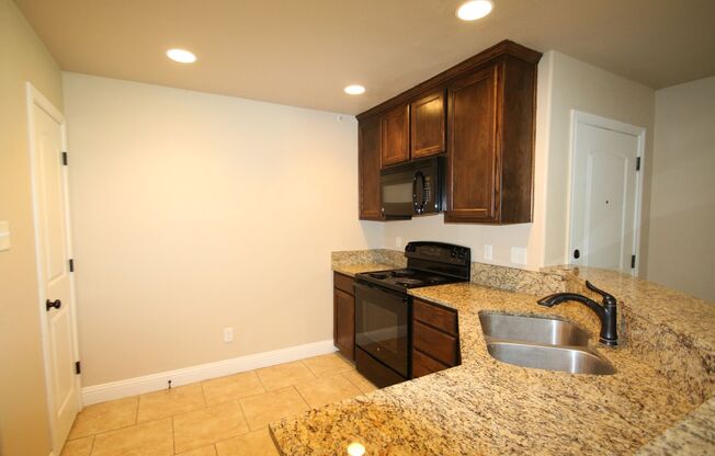 Classically Styled 3/2 In Wonderful Weatherford! ((All Kitchen Appliances Included)) Granite Countertops & Custom Wood Cabinets ~ Master Suite w/ Walk In Closet ~ Covered Parking & Landscaping Included! ((Coming Soon))