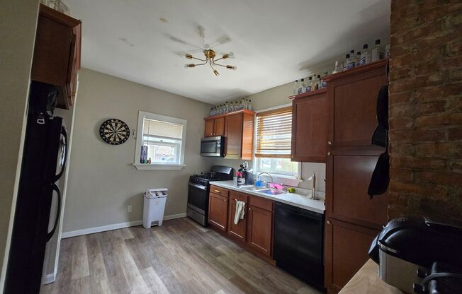 Large 5 Bedroom 2 Bath Single Family Home! Off Street Parking - On Site Laundry!