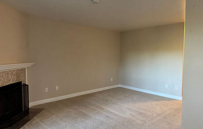 Serene Ground-Floor Condo Overlooking Green Space – Parking Included