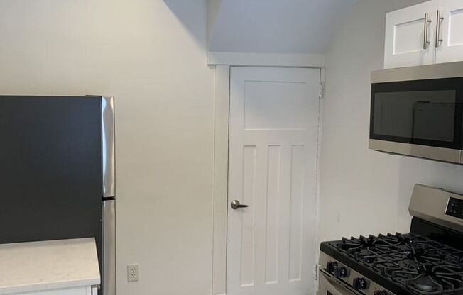 Great Morningside Row House with Front Porch!