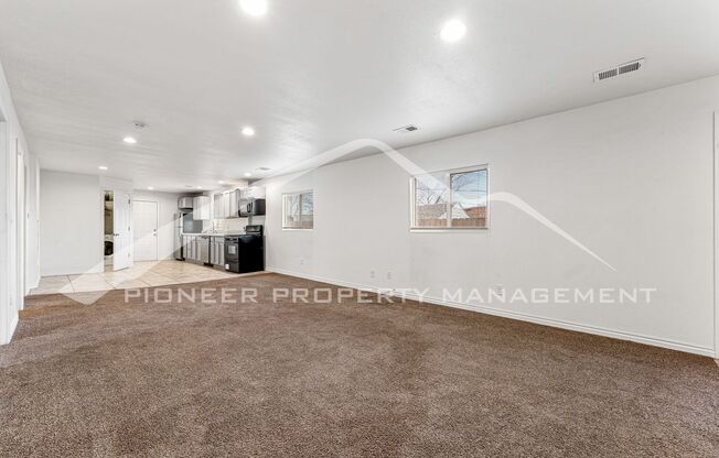 Lower Level Half Duplex with Two Car Garage and Fenced Yard