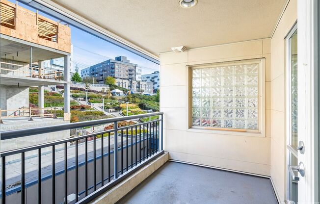 Top-Floor Condo with Office/Den + Private Balcony in the Heart of Seattle