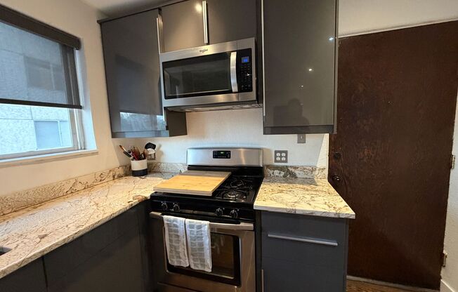 Turnkey Top-Floor Living in Gated Community Near City Park, Dining & Hospitals