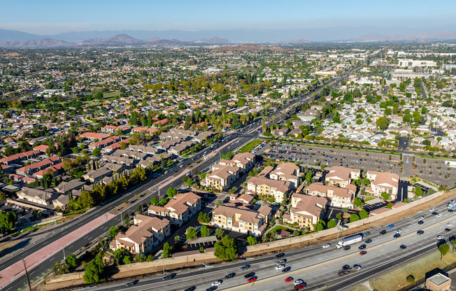 an aerial view of the freeway and suburbs