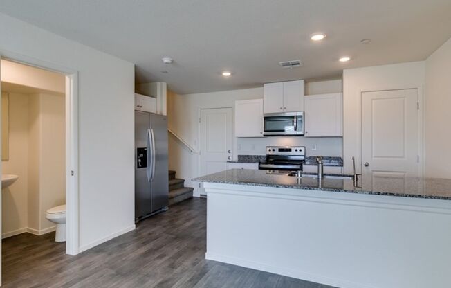 New townhome with attached 2 car garage.