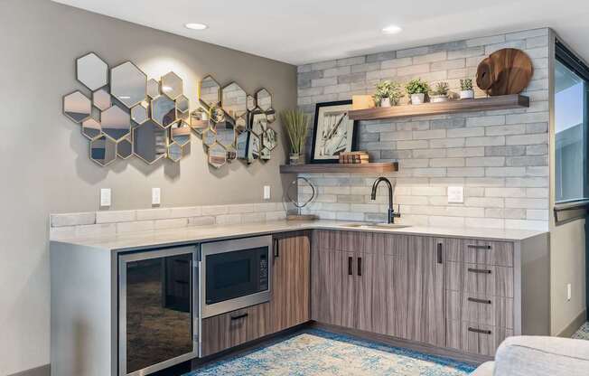 A modern kitchen with a stainless steel oven and wooden cabinets.