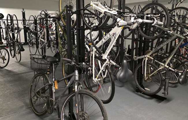 A room full of bicycles of various sizes and colors.