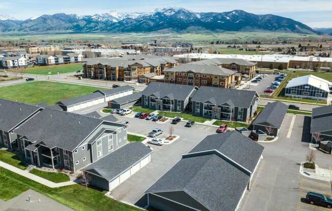 a city with mountains in the background at Madison Park, Bozeman, 59718