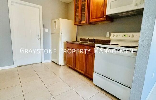 1409 E 108 AVE