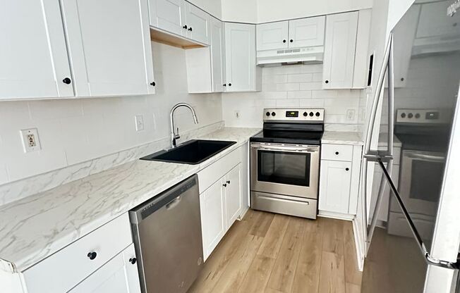 Affordable 2 bedroom 1 bath rom apartment Near Westminster Square + Parking Lot