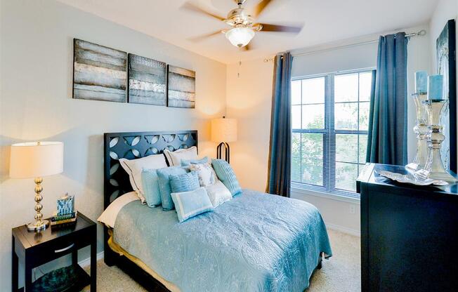 Large bedrooms with bright windows at Mission at La Villita Apartments in Irving, TX offers 1, 2 & 3 bedroom apartment homes with appliances.