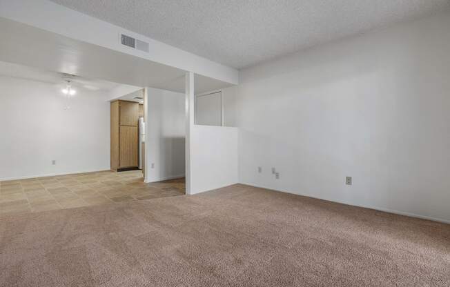 Living room and dining area at Townhomes on the Park Apartments in Phoenix AZ Nov 2020