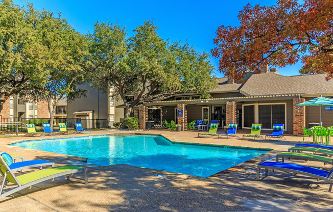 Outdoor swimming pool  at The Summit Apartments in Mesquite, Texas, TX