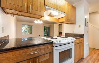 Modern 2-Bed / 2.5-Bath Condo Near OHSU — Assigned Garage Parking - 1 Month Free Special