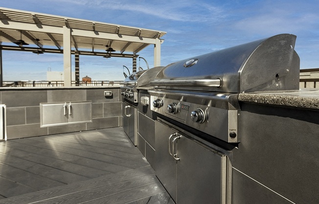 Rooftop BBQ area with seating