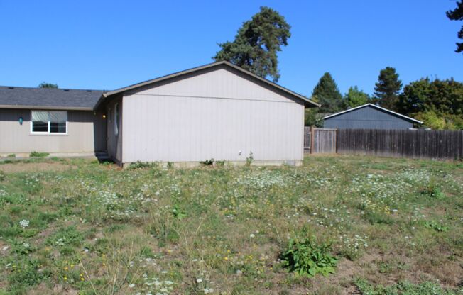4 bedroom 2 bath house, large backyard