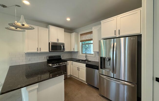 Gorgeous & modern free-standing home in ‘02!
