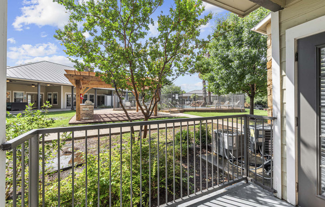 the preserve at ballantyne commons balcony and yard with trees
