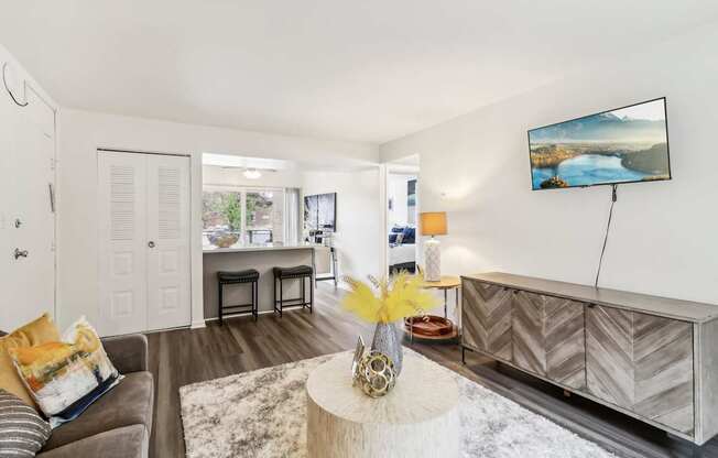 a living room with a couch and a table