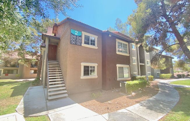 ADORABLE 2 BEDROOM 2 BATHROOM SECOND STORY CONDO LOCATED IN A LOVELY GATED COMMUNITY