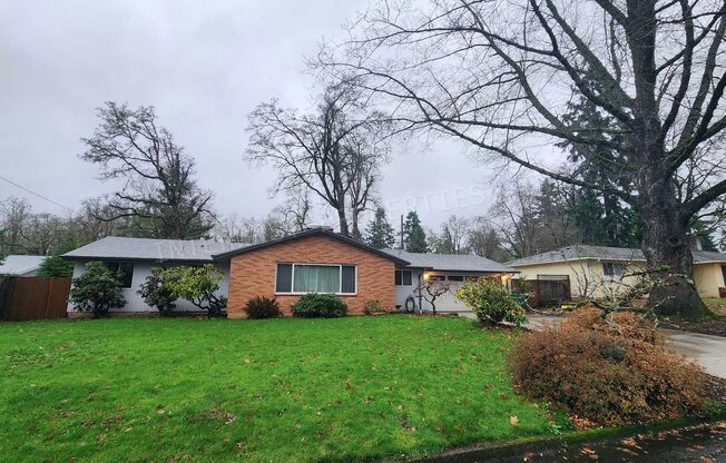 3 bd 2ba Ranch Style Home with Fenced Yard, W/D in Unit, Fireplaces & 2 Car Garage!