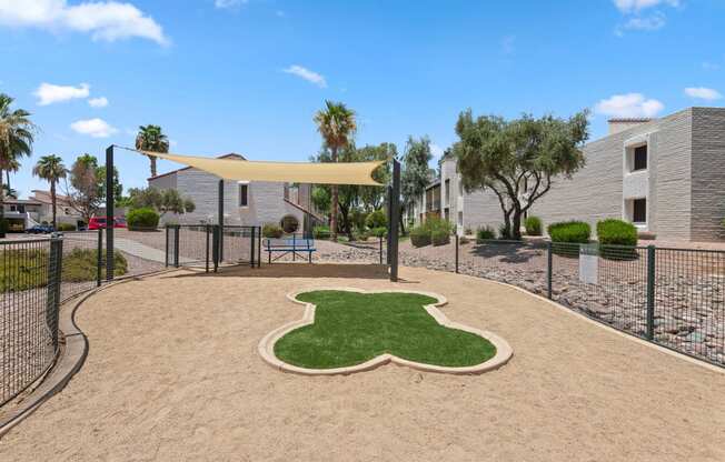 our apartments showcase a dog park with a kennel and agility course