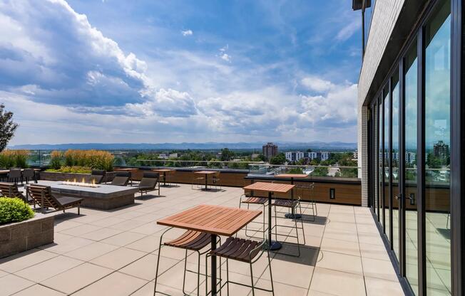 Take in the city and mountain views from this rooftop terrace, designed with multiple seating areas and a cozy fire pit.