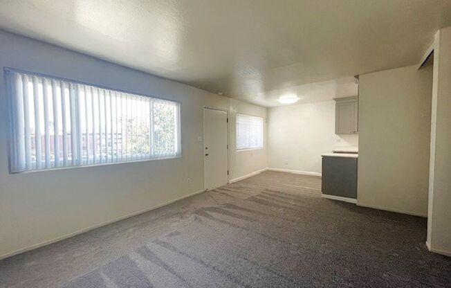 Upper- 2 Bedroom-One Bath apartment has a large living room