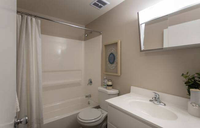 This is picture of the full bathroom in the 823 square foot 2 bedroom apartment at Aspen Village Apartments in the Westwood neighborhood of Cincinnati, OH.