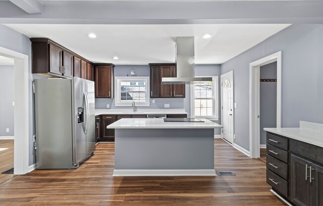Newly Renovated, In-law Suite, Master on the main floor.