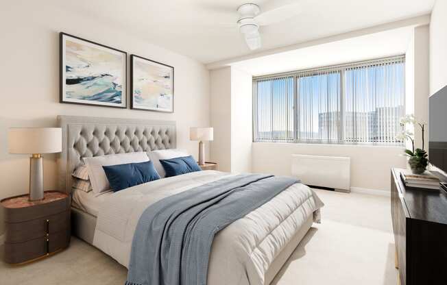 a bedroom with a bed and a large window