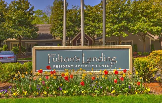 the sign at Fulton's Crossing and Landing Apartments