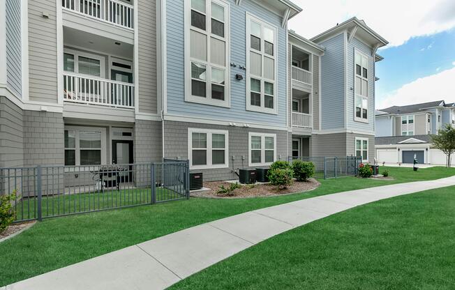 a large lawn in front of a building