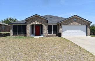 TWO LIVING ROOMS AND TWO DINING ROOMS! Solar panels to help save on electric bill!