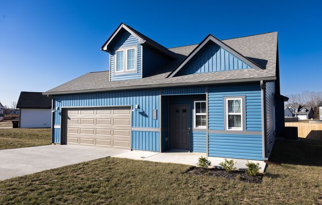 Elegant Home with Stone Fireplace, Kitchen Island and Designer Primary Suite